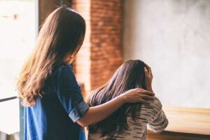 woman helps a friend in understanding addiction 